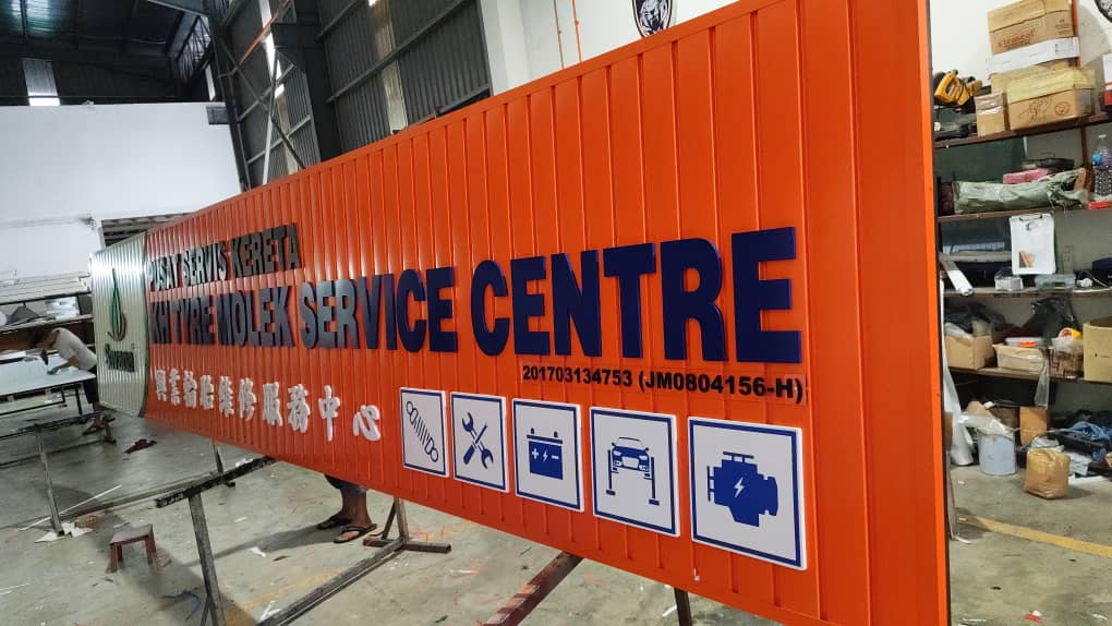 KH Tyre Molek Service Centre horizontal aluminium strip signboard in orange